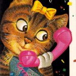 Кошечка звонит по телефону